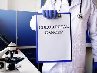 Colorectal cancer diagnosis on the clipboard.