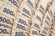 © RomanR - pile of 500 banknotes ukrainian money as financial background. Money and save concept