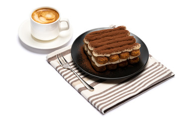 Classic tiramisu dessert on ceramic plate and cup of coffee isolated on white background with clipping path