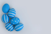 Six Blue Decorated Eggs Lie In The Corner On A White Background. Blue Painted Striped Easter Eggs Are Isolated On White. Happy Easter Card With A Place For Text. Copy Space.