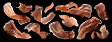 Sliced Jamon, Dry Italian Prosciutto Crudo, Spanish Ham On Black Background
