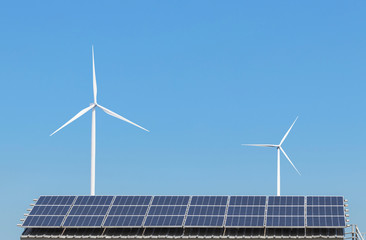 Wall Mural - solar panels and wind turbines generating electricity is solar energy and wind energy in hybrid powe