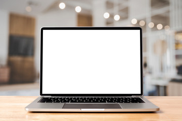 laptop blank screen on wood table with coffee cafe background, mockup, template for your text, clipp