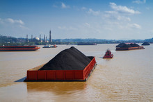 Coal Transported By The Barges On Mahakam River, Samarinda, East Kalimantan, Indonesia