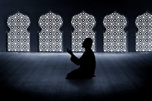 Silhouette Of Muslim Man Praying