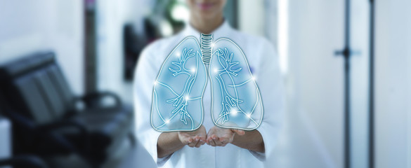 doctor holds the sensory lungs. Diseases and treatment of lungs, bronchitis, pneumonia