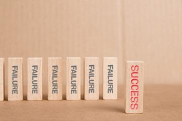 Wall Mural - Wooden Blocks with Failure and Success Concept