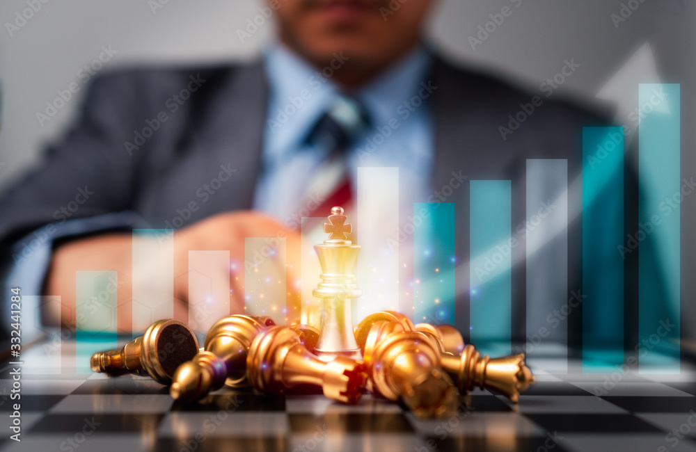 Selective focus of golden chess and success business graph in front of professional business analysis man. Concept of leadership must-have solution for the financial crisis, Investment planning - obrazy, fototapety, plakaty 