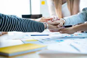 Wall Mural - Teamwork,partnership and Social connection in business join hand together concept.Hand of diverse people connecting.Power of volunteer charity work, Stack of people hand.