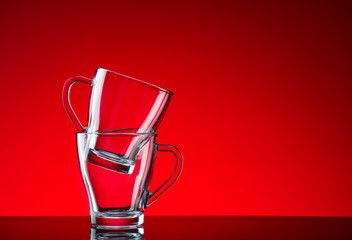 Crystal glasses shot close-up on a red background