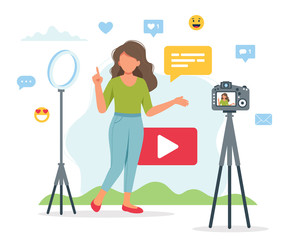 Wall Mural - female video blogger recording video with camera and light. different social media icons. cute vecto
