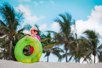 Sticker - cute little girl with floatie on tropical beach