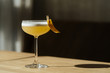 © Peter Karasev/ADDICTIVE STOCK - Close up of cocktail served in glass decorated with lemon peel
