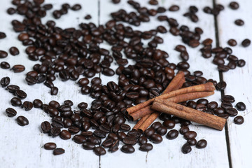 coffee beans,  cinnamon on a wooden table. Breakfast coffee. Morning. espresso