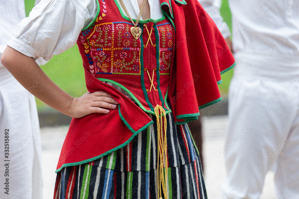 Close up of female dancer clothe of the traditional folklore of Madeira Island, "Bailinho da Madeira". - obrazy, fototapety, plakaty 