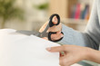 © PheelingsMedia - Woman hands cutting paper with scissors at home