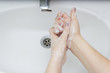 © Maryna - Hygiene. Cleaning Hands. Washing hands on sink.