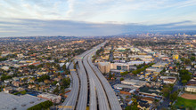 Aerial View Of Empty Freeway Streets With No People In Downtown Los Angeles California USA Due To Coronavirus Pandemic Or COVID-19 Virus Outbreak And Quarantine