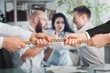 © BillionPhotos.com - Business people pulling rope in opposite directions at office