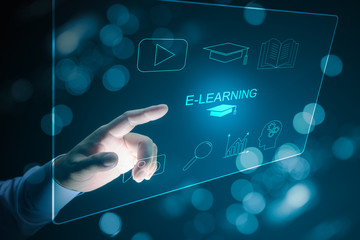 Hand touching on virtual screen E-learning Education Internet Technology Webinar Online Courses concept.