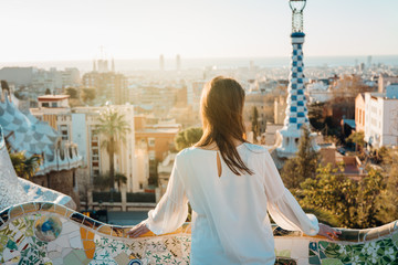 young female tourist spending vacation in barcelona,catalonia,spain.traveling to europe,visiting par
