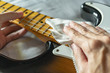 © wachiwit - Cleaning electric guitar with microfiber cloth