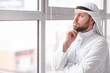 © Pixel-Shot - Arab businessman near window in office
