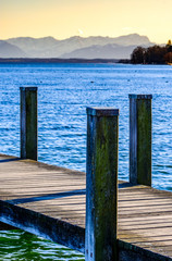 Wall Mural - old wooden jetty at a lake