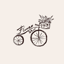 Bicycle With A Basket Of Flowers.