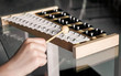 © irnburch - Xylophone closeup with a hammer in a child's hand