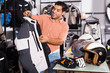 © JackF - Man choosing jacket for moto