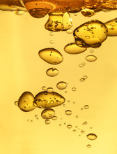 Golden Yellow Bubble Oil Droplet, Abstract Background
