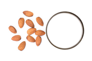 Wall Mural - Glass of Almond milk and almond seeds isolated on white. 