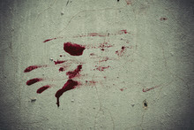 Red Blood Like Hand Shape Stuck On The Grunge Wall Background In Abandoned House. Halloween Haunted Scene And Spooky Concept.