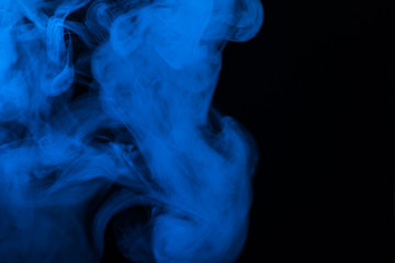 Blue steam on a black background.