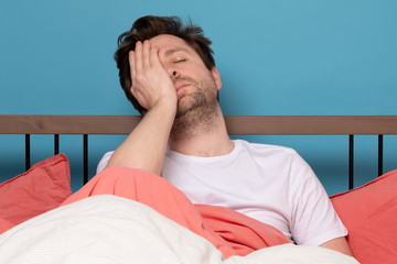 Wall Mural - man in is exhausted with insomnia or illness being in depression