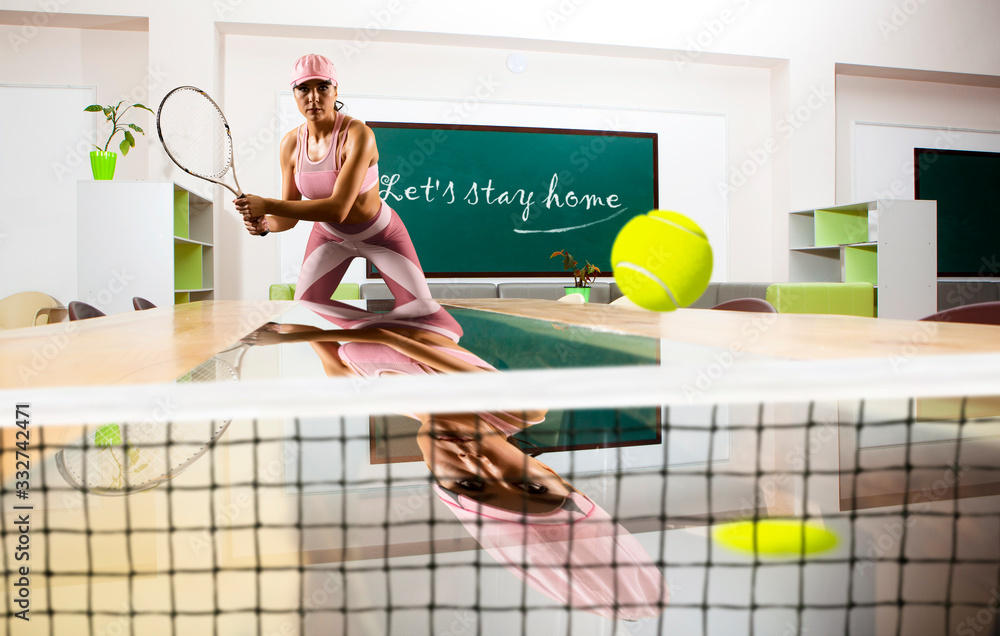 Let's stay home. Quarantine. Female tennis player. Sport concept - obrazy, fototapety, plakaty 