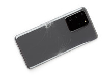 Smartphone With A Broken Back Cover On A White Background.