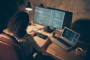 Top above high angle view photo of focused afro american girl it company seo administrator sit desk table work evening late use computer have web testing data research in workplace workstation