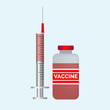 © Nashit - Red Vaccine bottle and injection syringe on blue background vector medical illustration
