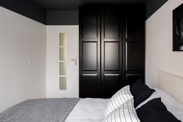 Canvas Print - Bedroom with black wardrobe