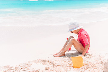 Wall Mural - Portrait of adorable little girl at beach during summer vacation