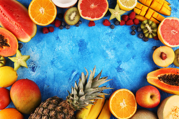 Tropical fruits background, many colorful ripe fresh tropical exotic fruits