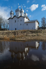 Wall Mural - Veliky Novgorod. Church of Boris and Gleb in Carpenters with reflection in the water