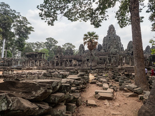 Angkor Thom Temple. The ancient stone faces of Bayon temple. Siem Reap, Cambodia