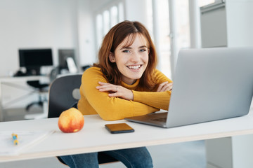 Happy healthy young office worker