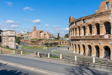 Wall Mural -  Following the coronavirus outbreak, the italian Government has decided for a massive curfew, leaving even the Old Town, usually crowded, completely deserted. Here in particular the Colosseum