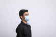 © PRASANNAPIX - Young man wearing protective mask again Covid-19. corona virus.