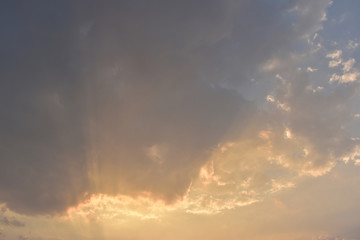 golden light rays of sunset sky background