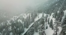 Aerial Angeles Crest Highway In Snow And Fog